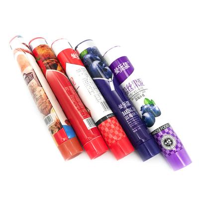 China Wholesale Quick Clear Glossy Soft Aluminum Barrier Laminated Tube Empty Recyclable Food Packaging Tube Material for sale