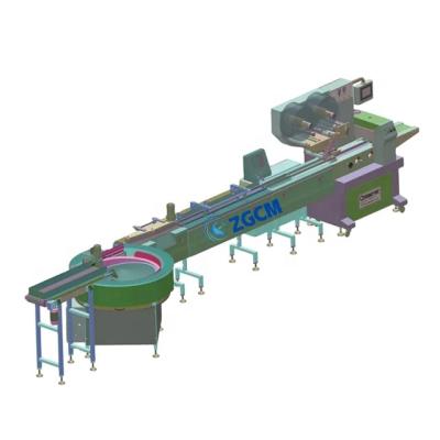 China Automatic feeding chocolate candy packing machine Automatic horizontal pillow tray feeding packaging machine for sale