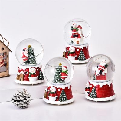 China Modern Crystal Ball Led Music Christmas Snowflake Resin Creative Glass Ball Glass Ornament for sale