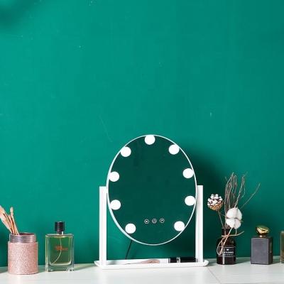 China 9 Lighted LED Lights Vanity Mirror With Standing Round Silver Touch Screen Switch White Makeup Mirror OEM for sale