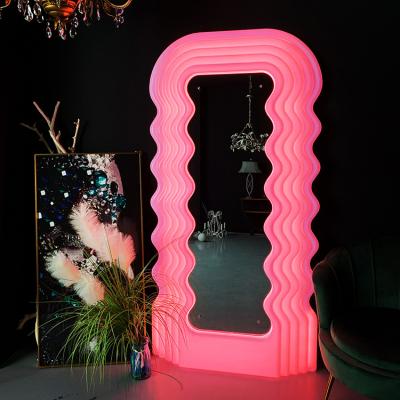 China Modern Luxury Led Bright Floor Length Dressing Table Mirror Makeup Smart Led Light Wavy Mirror Remote Control for sale