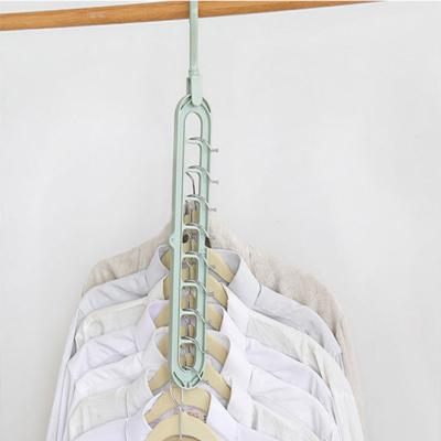 China Plastic Foldable Clothes Hanger 360 Modern Creative Rotation Nine Hole for sale