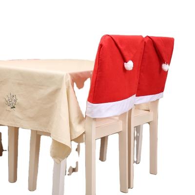 China Wholesale Classic Red Polyester 2022New TaoXi Santa Hat Chair Cover Christmas Decoration for sale