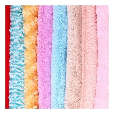 China Other Soft Long Hair 100% Polyester PV Plush Faux Fur Fabric For Making Soft Toy for sale