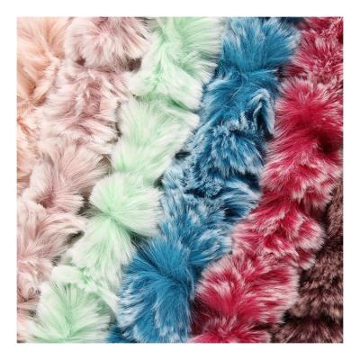 China Top Quality 100% Brush Flower Polyester Faux Rabbit Fur Fabric For Women Garment for sale