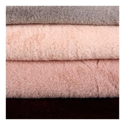 China Auto Manufacturer High Quality Red 100% Polyester Upholstery Faux Rabbit Fur Trim Fabric for sale