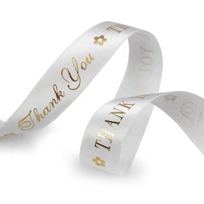 China Recycled Materials Custom Printed Rose Gold Foiled Logo White Grosgrain Ribbon In Roll for sale