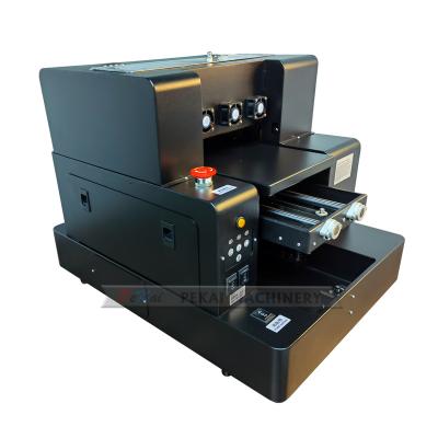 China Garment Shops Latest Upgrade A4 Full Format Printing UV Printer For Plastic , Metal , Acrylic for sale