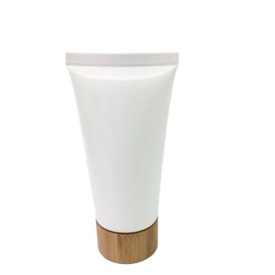 China Bottles Bamboo Screw Cap 30mm Diameter Empty Soft Tube For Cosmetic Packaging for sale