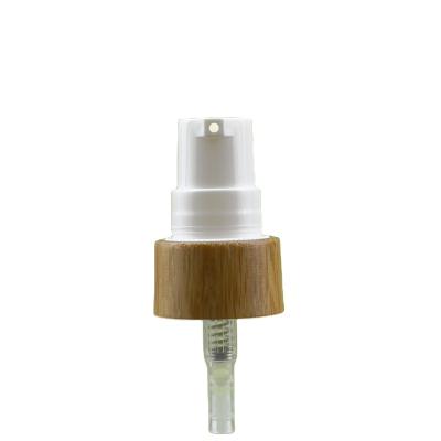 China Bottles Hot Sale 18mm 410 Bamboo Cosmetic Treatment Pump 18 Bamboo Dispenser With Transparent Cover for sale