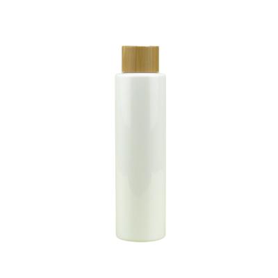 China 150ML Cosmetic White High Quality Custom Logo PET Material Color Serum Bottle With Bamboo Screw Cover for sale