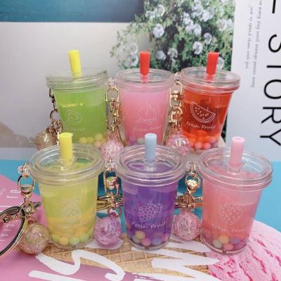 China New trends 2021 anniversary Mini Pearl Milk Tea Cup acrylic liquid filled boba key chain creative boba key chain for sale