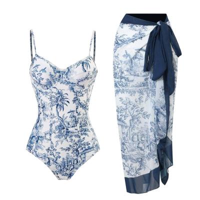 China 2023 new vintage antibacterial printing one-piece bikini swimsuit chiffon long edge with steel pump swimsuit for sale