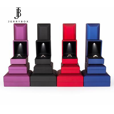 China Ring Luxury Plastic Ring Set Jewelry Box With Led Light for sale