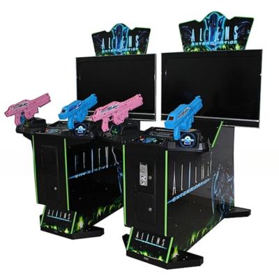 China Dreamland coin operated video games 4 in 1 double shooting gun game machines aliens shooting arcade game machine for sale