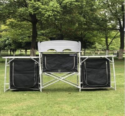 China Portable Folding Cloth Alu Camping Kitchen Kitchen Picnic Aluminum Alloy BBQ Cabinet Table Storage Rack for sale