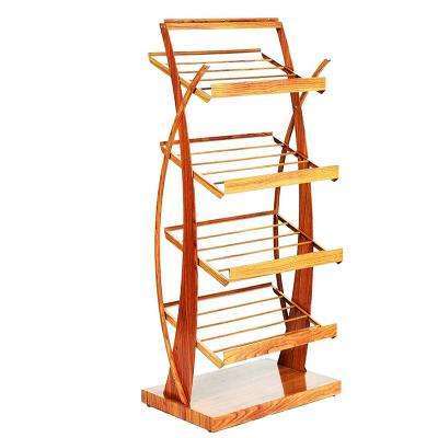 China Wooden Stores Goods Shelf 4 Layers Commercial Display Shelf Retail Rack Magazine Book Display Wooden Food for sale