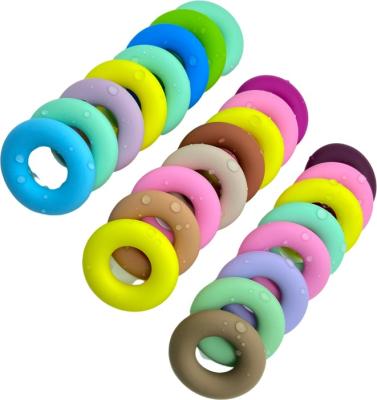 China BPA Free Round Donut Silicone Teething Ring Necklace Pendant Diy Baby Teething Nursing Beads Teether Relief Pain Ring for sale