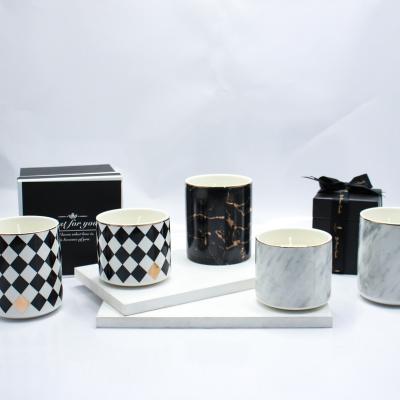 China Home Decoration Luxury Nordic Unique Customized Body Glazed Black And White Ceramic Cylinder Candle Jar With Customized Boxes for sale