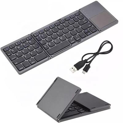 China Mini Pocket BT Wireless Folding Keyboard For Apple Android Laptop Tablet PC Mouse Pad Wireless Keyboard for sale