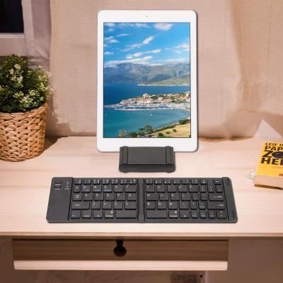 China BT Wireless Keyboard Keypad Ultra Thin Mini Folding Radio For IOS / Windows / Android Tablet for sale