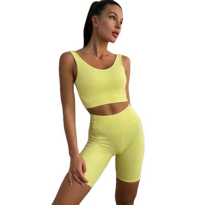 China 2021 New Breathable Fashion U Neck Simple Bodybuilding Yoga Clothing Shorts Two Pieces Set for sale