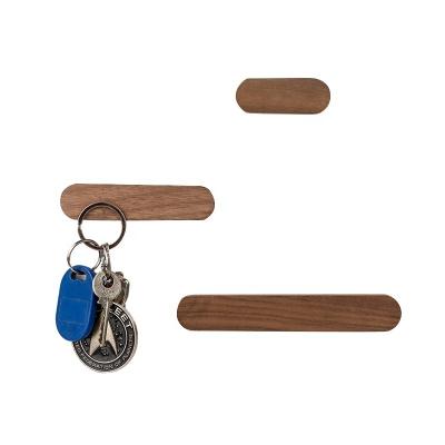 China Creative Custom Creative Free Standing Wooden Strong Magnet Main Entrance Wall Hanging Punch Wood Hook Solid Sticky Hook for sale