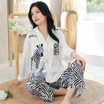 China NEW ARRIVALS QUICK DRY luxury silk cartoon long sleeve satin pajamas cute pajamas sleepwear for women for sale