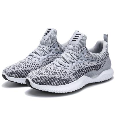 China Sports Running Wholesale Fashion Unisex Breathable Sneakers Sports Stock Couples Sneakers Customized Brand Running Shoes for sale