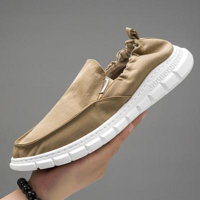 China SHOCK ABSORBING Logo Men Casual Canvas Driving Custom Made Shoes Waterproof Light Slip On Men's Flexible Boat Shoes for sale