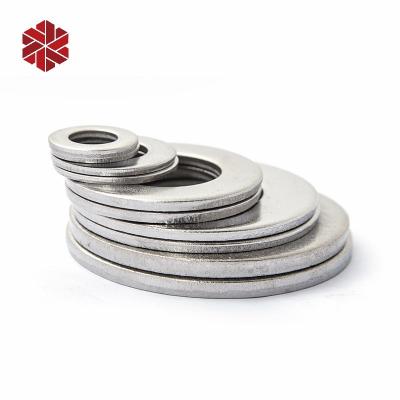 China Wedge Stock DIN125 DIN127 SS304 SS316 DIN1440 Metal Flat Washer for sale