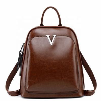 China Custom LOGO Vintage Ladies Leather Backpacks Fashion Cow Leather Backpack Waterproof Pinch Women's Small Backpack for sale