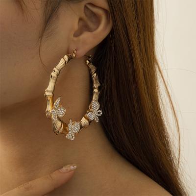 China Hiphop Wholesale Rhinestone Butterfly Circle Earrings Bamboo Gold For Women for sale