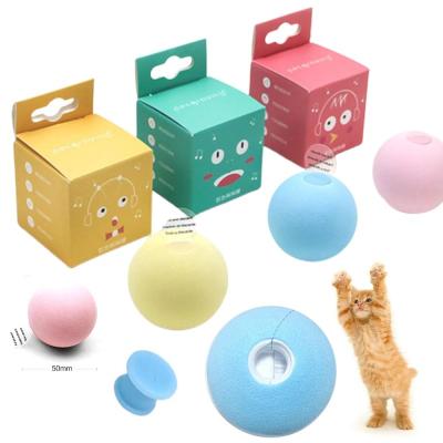 China 2021 New Style Cat Toys New Gravity Ball Stocked Smart Touch Sounding Interactive Pet Toys Squeak Ball for sale