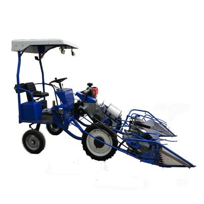 중국 with strong wheels new reaper binder for sale rice small grain harvester with seat four wheel 판매용