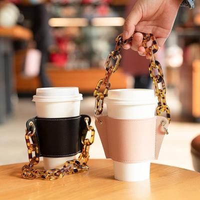 China Factory Direct Selling Coffee Paper Cup Holder Traditional Portable Leather Hand Strap Chain Holder Travel Beach Portable Cup Holder for sale