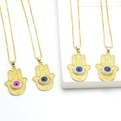 China Vintage Hot Selling Trendy Gold Plated Devil Eyes Hand Eye Charms Pendant Necklace For Women Hamsa Hand Product Evil Eye Necklace for sale