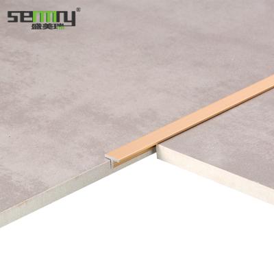 China Various Size Chinese Aluminum T Shaped Floor Transition Strip Tile Edge Trim for sale