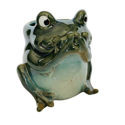 China OEM luxury creative high quality cute green frog statues for home decor ceramic frog figurine flower pot for sale