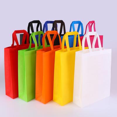 China Professional Supplier Handled Custom LOGO Printing Packaging Bags Reusable Non Woven Packaging Shopping Bags for sale