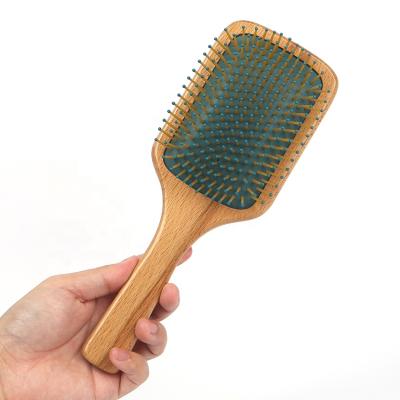 China Waterproof Custom Logo Free Custom Eco-Friendly Natural Wooden Massage Paddle Cushion Detangling Hair Brush for sale