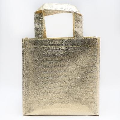 China Good sale best price recyclable golden aluminium film shopping embossing non woven bag for sale