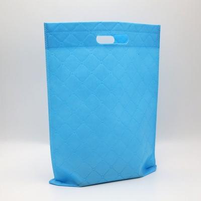 China 80g blue embossing reusable die Cut Ultrasonic Nonwoven promotion bag for sale