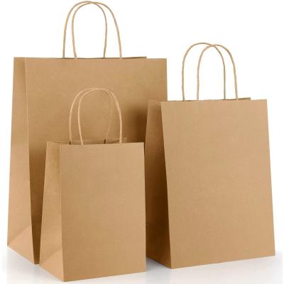 China El regalo de papel de Brown Kraft de los bolsos que hacen compras de Kuaima Kraft empaqueta 26x32x12 en venta