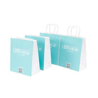 China Bolsos de papel reciclados al por menor de empaquetado del regalo de las bolsas de papel del boutique de la tienda de encargo de CMYK en venta