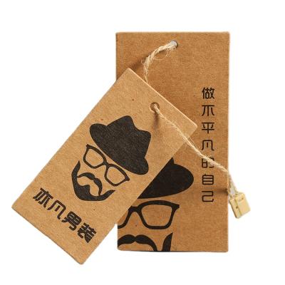 China Viable Factory Wholesale New Design Garment Label Hollow Brown Paper Hanger Tag for sale