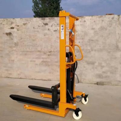 China Hotels Hydraulic Lift 2 Ton Hand Pallet Straddle Manual Winch Stacker for sale