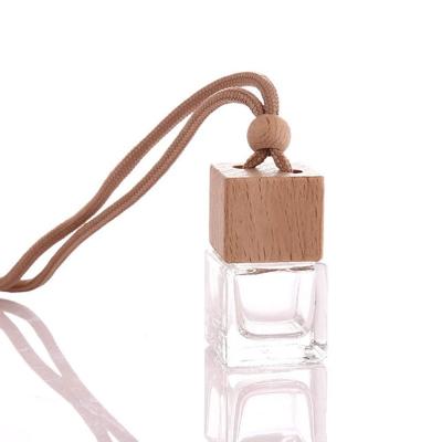 China A Fresher Hanging Car Air Freshener Essential Oil Bottle Car Ornaments Car Air Freshener With Wooden Essential Oil Fragrance Diffuser for sale