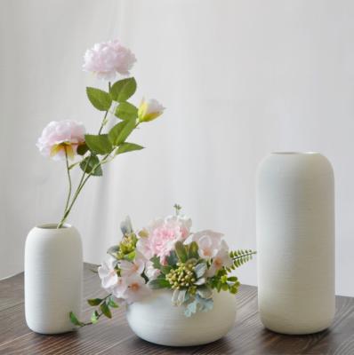 China Beautiful White Ceramic Irregular Flower Vase Plant Handmade Art Porcelain Vases Decoration For Home for sale