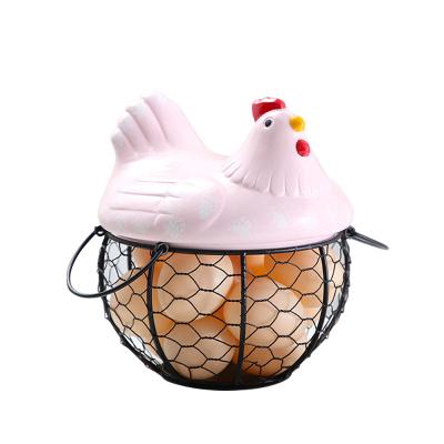 China Sustainable Metal Wire Egg Storage Basket With Top Handles Ceramic Chicken Fruit Snack Organizer Kitchen Decoration for sale